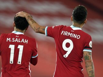 Mohamed Salah (l) und Roberto Firmino machten mit ihren Toren den Liverpool-Sieg gegen Tottenham perfekt. Foto: Peter Powell/PA Wire/dpa Mohamed Salah (l) und Roberto Firmino machten mit ihren Toren den Liverpool-Sieg gegen Tottenham perfekt. Foto: Peter Powell/PA Wire/dpa