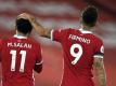 Mohamed Salah (l) und Roberto Firmino machten mit ihren Toren den Liverpool-Sieg gegen Tottenham perfekt. Foto: Peter Powell/PA Wire/dpa