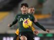 Tottenhams Son Heung-min (l) behauptet den Ball vor Wolverhamptons Marcal. Foto: Andrew Yates/CSM via ZUMA Wire/dpa