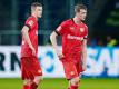 Beenden im Sommer ihre Karriere: Leverkusens Sven (l) und Lars Bender. Foto: Uwe Anspach/dpa