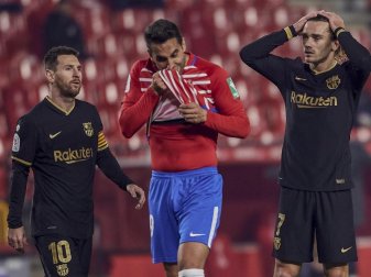 Antoine Griezmann (r) und Lionel Messi (l) sind mit dem FC Barcelona in Rückstand geraten. Foto: Uncredited/AP/dpa Antoine Griezmann (r) und Lionel Messi (l) sind mit dem FC Barcelona in Rückstand geraten. Foto: Uncredited/AP/dpa