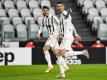 Cristiano Ronaldo (r) feiert sein Führungstor gegen die Roma. Foto: Marco Alpozzi/LaPresse/AP/dpa