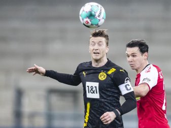 Der BVB verlor mit Kapitän Marco Reus (l) in Freiburg. Foto: Tom Weller/dpa Der BVB verlor mit Kapitän Marco Reus (l) in Freiburg. Foto: Tom Weller/dpa