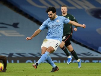 Ilkay Gündogan (M) von Manchester City in Aktion. Foto: Rui Vieira/PA Wire/dpa Ilkay Gündogan (M) von Manchester City in Aktion. Foto: Rui Vieira/PA Wire/dpa