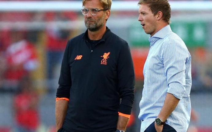 Treffen mit ihren Teams in Budapest aufeinander: Liverpool-Coach Jürgen Klopp (l) und Leipzigs Julian Nagelsmann. Foto: Dave Thompson/AP/dpa