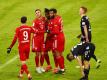 Alphonso Davies (3.vl) rettete dem FC Bayern einen Punkt gegen Aufsteiger Arminia Bielefeld. Foto: Adam Pretty/Getty Images Europe/Pool/dpa