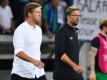 Treffen mit ihren Teams in Budapest aufeinander: Leipzig-Coach Julian Nagelsmann (l) und Liverpools Jürgen Klopp. Foto: picture alliance / Uwe Anspach/dpa