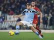 Lazios Ciro Immobile (l) freut sich auf das Duell mit dem FC Bayern München. Foto: Gregorio Borgia/AP/dpa