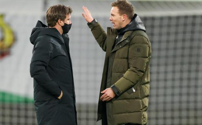 Sieht keinen Grund für einen Wechsel von Leipzig-Coach Julian Nagelsmann (r): RB-Sportdirektor Markus Krösche. Foto: Jan Woitas/dpa-Zentralbild/dpa