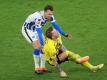 Herthas Vladimir Darida sah für das Foul gegen Marco Reus die Rote Karte. Foto: Friedemann Vogel/EPA-Pool/dpa