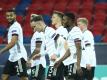 Deutschlands U21 ist nach dem EM-Auftaktsieg gegen Ungarn nun im Klassiker gegen die Niederlande gefordert. Foto: Csaba Domotor/dpa