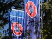 Flaggen mit dem Logo der UEFA wehen im Garten des Hauptquartiers der Union. Foto: Soeren Stache/dpa