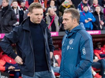 Mit der Verpflichtung von Trainer Julian Nagelsmann (l) macht Bayern München für Hansi Flick den Weg ins Amt des Bundestrainers frei. Foto: Matthias Balk/dpa Mit der Verpflichtung von Trainer Julian Nagelsmann (l) macht Bayern München für Hansi Flick den Weg ins Amt des Bundestrainers frei. Foto: Matthias Balk/dpa