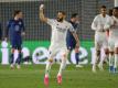 Karim Benzema (M) von Real Madrid feiert sein Tor gegen den FC Chelsea. Foto: Isabel Infantes/PA Wire/dpa