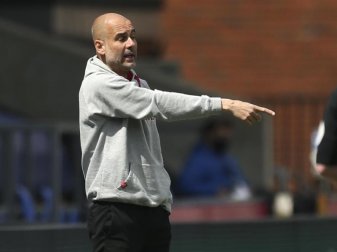 Erwartet gegen Paris Saint-Germain ein hartes Spiel: Pep Guardiola, Trainer von Manchester City. Foto: Steve Paston/Pool PA/dpa Erwartet gegen Paris Saint-Germain ein hartes Spiel: Pep Guardiola, Trainer von Manchester City. Foto: Steve Paston/Pool PA/dpa