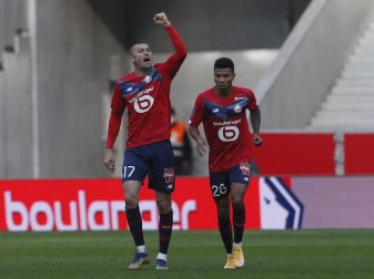 Lille-Stürmer Burak Yilmaz (l) traf in Lens doppelt. Foto: Michel Spingler/AP/dpa Lille-Stürmer Burak Yilmaz (l) traf in Lens doppelt. Foto: Michel Spingler/AP/dpa