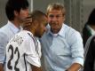 Vor der WM 2006 holten Bundestrainer Jürgen Klinsmann (r) und Joachim Löw David Odonkor in den DFB-Kader. Foto: Oliver Berg/dpa