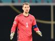 DFB-Torwart Manuel Neuer freut sich, dass Thomas Müller und Mats Hummels in die Nationalmannschaft zurückkehren. Foto: Robert Michael/dpa-Zentralbild/dpa