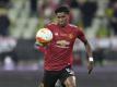 United-Stürmer Marcus Rashford wehrt sich gegen rassistische Beleidigungen. Foto: Michael Sohn/AP Pool/dpa