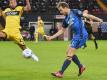 Schalke-Neuzugang Thomas Ouwejan (r) in Aktion für Udinese Calcio. Foto: Andrea Bressanutti/LaPresse via ZUMA Press/dpa