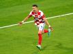 Die Kroaten müssen auf Ivan Perisic verzichten. Foto: Owen Humphreys/PA Wire/dpa