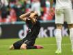 Zum Haare raufen: Thomas Müller trauert seiner vergebenen Großchance gegen England nach. Foto: Justin Tallis/Pool AFP/dpa