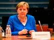 Angela Merkel war nach dem EM-Aus des DFB-Teams «enttäuscht und ein bisschen traurig». Foto: Tobias Schwarz/AFP/POOL/dpa