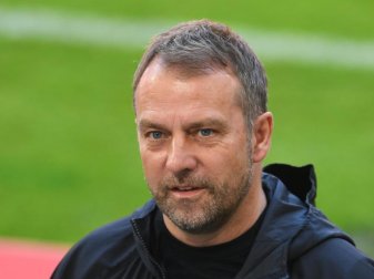 Flick stellt sich am Dienstag erstmals als Bundestrainer auf einer Pressekonferenz den Fragen der Journalisten. Foto: Andreas Gebert/Reuters-Pool/dpa Flick stellt sich am Dienstag erstmals als Bundestrainer auf einer Pressekonferenz den Fragen der Journalisten. Foto: Andreas Gebert/Reuters-Pool/dpa