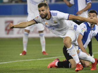 Real-Profi und Torschütze Nacho (l) feiert den zweiten Treffer seiner Mannschaft. Foto: Alvaro Barrientos/AP/dpa Real-Profi und Torschütze Nacho (l) feiert den zweiten Treffer seiner Mannschaft. Foto: Alvaro Barrientos/AP/dpa
