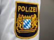 Die Polizei in Bayern pflegt eine Datenbank mit Personalien von Fußballfans und wird deswegen kritisiert. Foto: Daniel Karmann/dpa