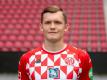 Wechselt von Mainz nach Köln: Luca Kilian. Foto: Torsten Silz/dpa