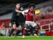 Arsenals Willian (R) behauptet im Zweikampf den Ball vor Burnleys Charlie Taylor. Foto: Catherine Ivill/PA Wire/dpa