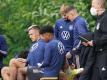 Auch die Youngster Nico Schlotterbeck (l), Karim Adeyemi (2.v.l) und Florian Wirtz (r) stehen im DFB-Aufgebot. Foto: Marcus Brandt/dpa