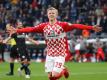 Spielt derzeit beim FSV Mainz 05 groß auf: Jonathan Burkardt. Foto: Friso Gentsch/dpa