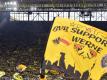 Die Dortmunder Fans feuern ihr Team an. Foto: Bernd Thissen/dpa