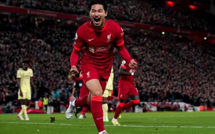 Liverpools Takumi Minamino feiert seinen Treffer zum 4:0. Foto: Peter Byrne/PA Wire/dpa