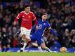 Jadon Sancho (l) von Manchester United setzt sich durch und erzielt das 0:1. Foto: Adam Davy/PA Wire/dpa