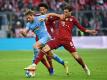 Der FC Bayern München muss vor dem Bundesliga-Topspiel weiter um den angeschlagenen Nationalspieler Leon Goretzka (r) bangen. Foto: Sven Hoppe/dpa