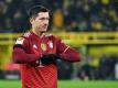 Sorgte mit dem verwandelten Elfmeter für den Sieg der Bayern in Dortmund: Robert Lewandowski. Foto: Bernd Thissen/dpa