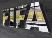 Das Logo der FIFA ist außen am Hauptsitz des Weltfußballverbandes zu sehen. Foto: Ennio Leanza/KEYSTONE/epa/dpa