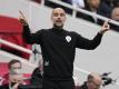 Manchester Citys Coach Pep Guardiola hat sich mit dem Coronavirus infiziert. Foto: Matt Dunham/AP/dpa