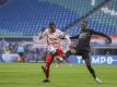 Der Leipziger Nordi Mukiele (l) soll bei Atlético auf dem Zettel stehen. Foto: Jan Woitas/dpa-Zentralbild/dpa