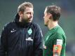 Arbeiteten schon bei Werder Bremen zusammen: Trainer Florian Kohfeldt (l) und Max Kruse. Foto: Carmen Jaspersen/dpa