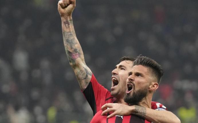 Olivier Giroud (vorne) erzielte im Mailänder Derby zwei Tore für AC Mailand. Foto: Antonio Calanni/AP/dpa