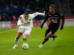Trotz Wechselgerüchten: Kylian Mbappe (l) von Paris Saint Germain zeigt starke Leistungen in der Ligue 1 und der Champions League.