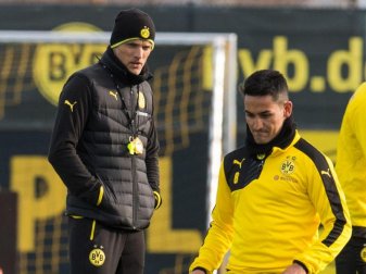 Trainer Thomas Tuchel (l) hofft, dass Ilkay Gündogan beim BVB bleibt. Foto: Bernd Thissen Trainer Thomas Tuchel (l) hofft, dass Ilkay Gündogan beim BVB bleibt. Foto: Bernd Thissen