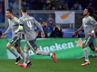 Real Madrids Superstar Cristiano Ronaldo (l) traf zum 1:0 gegen den AS Rom. Foto: Ettore Ferrari Real Madrids Superstar Cristiano Ronaldo (l) traf zum 1:0 gegen den AS Rom. Foto: Ettore Ferrari