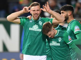 Niclas Füllkrug (l) entschied das Spitzenspieler gegen Darmstadt zu Gunsten von Werder Bremen. Niclas Füllkrug (l) entschied das Spitzenspieler gegen Darmstadt zu Gunsten von Werder Bremen.