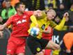 BVB-Star Erling Haaland (r) im Zweikampf mit Leipzigs Willi Orban.