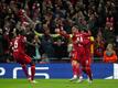 Liverpools Jordan Henderson (M), Mohamed Salah (r) und Ibrahima Konate (l) jubeln über das 1:0 gegen den FC Villarreal.
